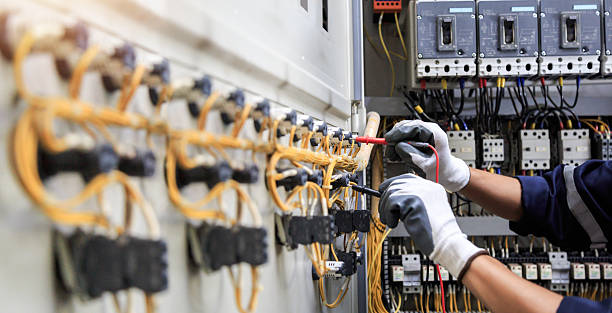 Professional Electrician technician working in Woodstock, GA